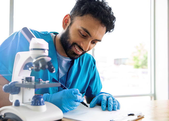 International med tech using a microscope International med tech using a microscope